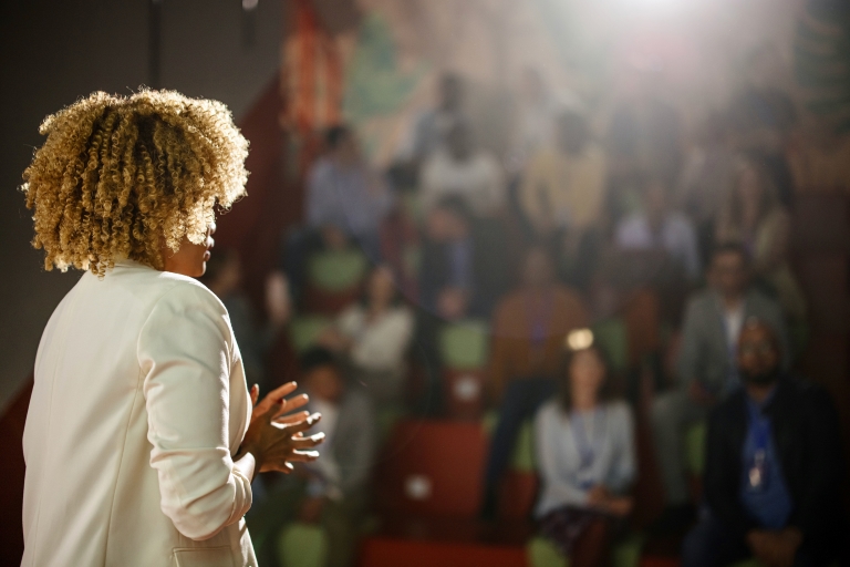 A lady addressing a seminar